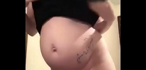 Pregnant honey showing off Juicy Ass